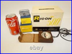 Vintage Ricoh 500 camera + telephoto lens + meter + Photrix meter etc