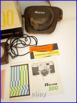 Vintage Ricoh 500 camera + telephoto lens + meter + Photrix meter etc