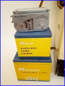 Vintage Ricoh 500 camera + telephoto lens + meter + Photrix meter etc