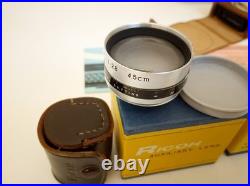 Vintage Ricoh 500 camera + telephoto lens + meter + Photrix meter etc