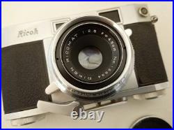 Vintage Ricoh 500 camera + telephoto lens + meter + Photrix meter etc