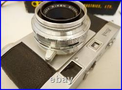 Vintage Ricoh 500 camera + telephoto lens + meter + Photrix meter etc