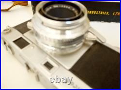 Vintage Ricoh 500 camera + telephoto lens + meter + Photrix meter etc