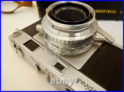 Vintage Ricoh 500 camera + telephoto lens + meter + Photrix meter etc