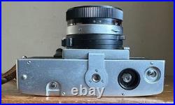Vintage Topcon Uni 35mm SLR Film Camera withUV Topcor 12 f=53mm Lens & Case Japan