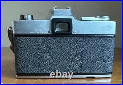 Vintage Topcon Uni 35mm SLR Film Camera withUV Topcor 12 f=53mm Lens & Case Japan