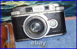 Vintage VOKAR II camera with Vokar 50 mm f/2.8 lens and case shelf display