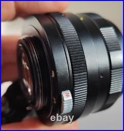 Vintage ZENIT TTL Olympian SLR film camera with Helios 44M 2/58 lens