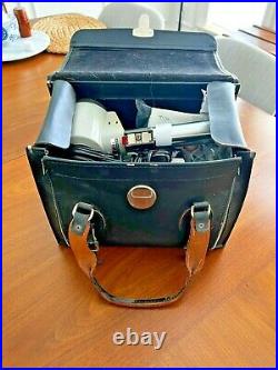 Vintage camera bodies, lenses, and bag $200