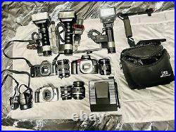 Vintage camera lot untested With Zoom lens Flashes And More