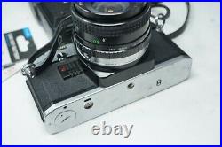 Vintage nOLYMPUS OM10 SLR FILM CAMERA WITH 28mm & Miranda 70-210 lens