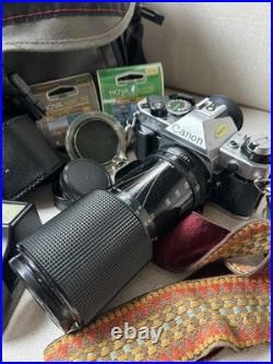 Vintage working Canon AE-1 Camera with Lens, flash tamrac Bag, Filters zoom strap