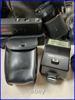 Vintage working Canon AE-1 Camera with Lens, flash tamrac Bag, Filters zoom strap
