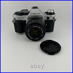 Vtg Canon AE-1 Program 35mm SLR Camera 50mm f/1.8 w Manuals Made Japan TESTED