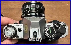 Vtg Canon AE-1 Program 35mm film SLR camera withCanon FD 50mm f/1.8 lens (lot b)