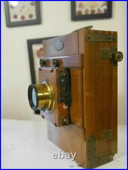 Wooden tailboard camera brass lens plate