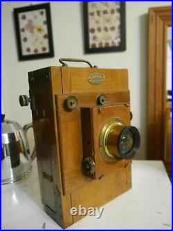 Wooden tailboard camera brass lens plate
