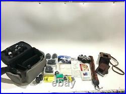 YASHICA FX-2 CAMERA With 28MM 50MM 135MM LENS FLASH AND POLAROID SET ALL IN BAG