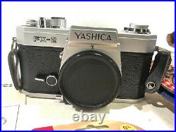 YASHICA FX-2 CAMERA With 28MM 50MM 135MM LENS FLASH AND POLAROID SET ALL IN BAG