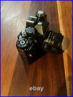 Zenit 12 XP 35mm SLR Film Camera Black with Helios-44M-4 Lens, Case